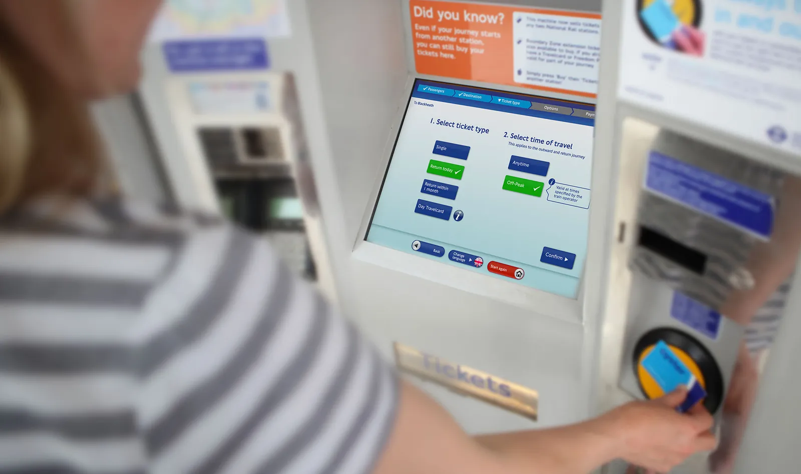 A user testing ticket options on a live ticket machine at the TfL test centre